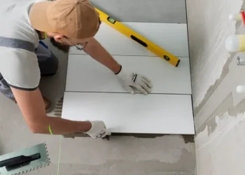tiler-working-renovation-apartment_23-2149278631 tiler-working-renovation-apartment_23-2149278631